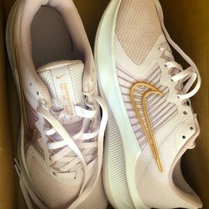 Women’s Nike Downshifters pink and gold